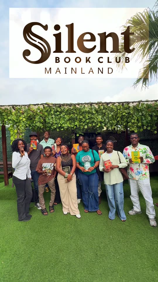 Guests sharing books at a Silent Book Club Mainland gathering